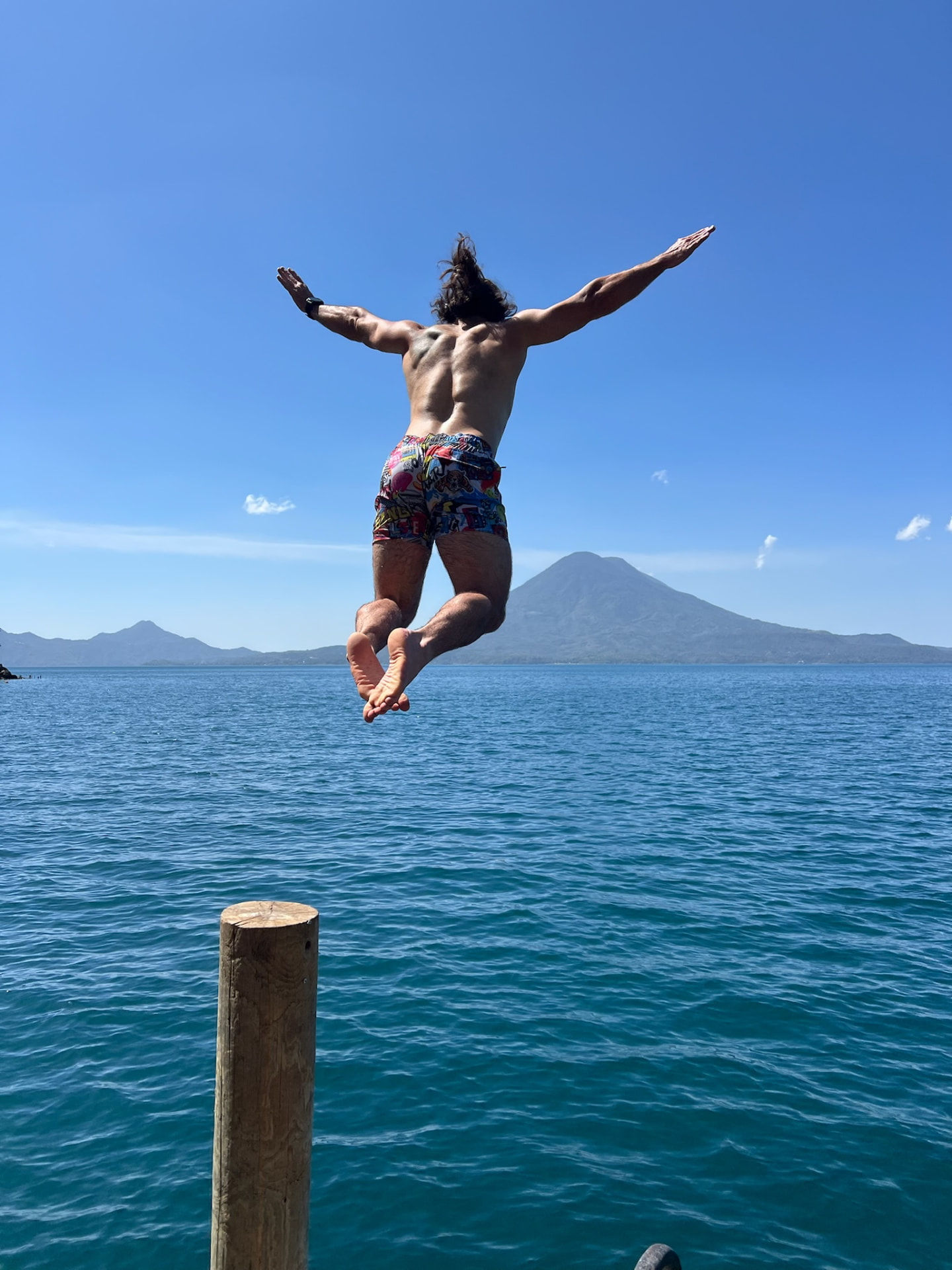 Jumping into Lake Atitlán from the dock